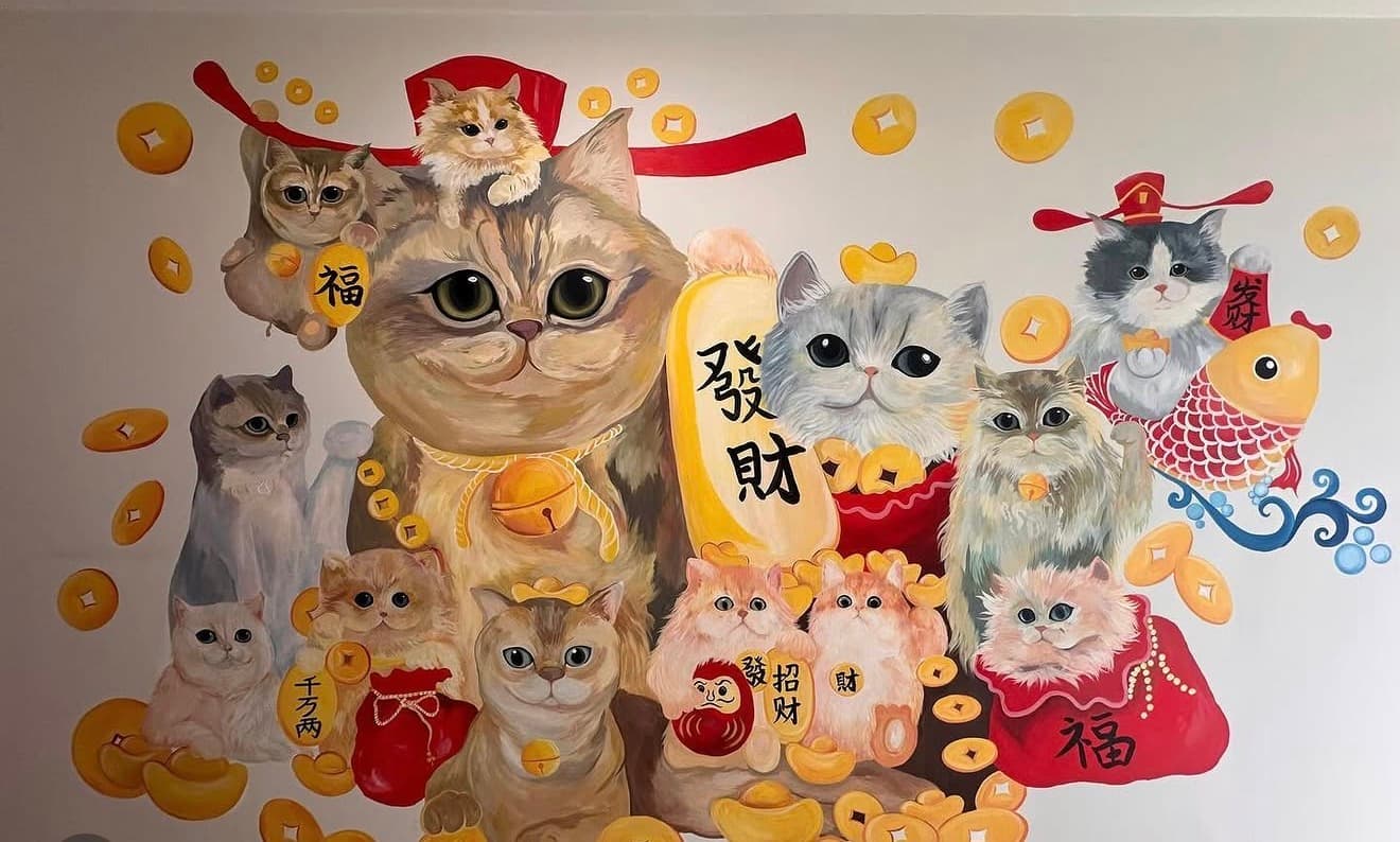 Whimsical mural of fluffy cats surrounded by gold coins and traditional Chinese prosperity symbols.